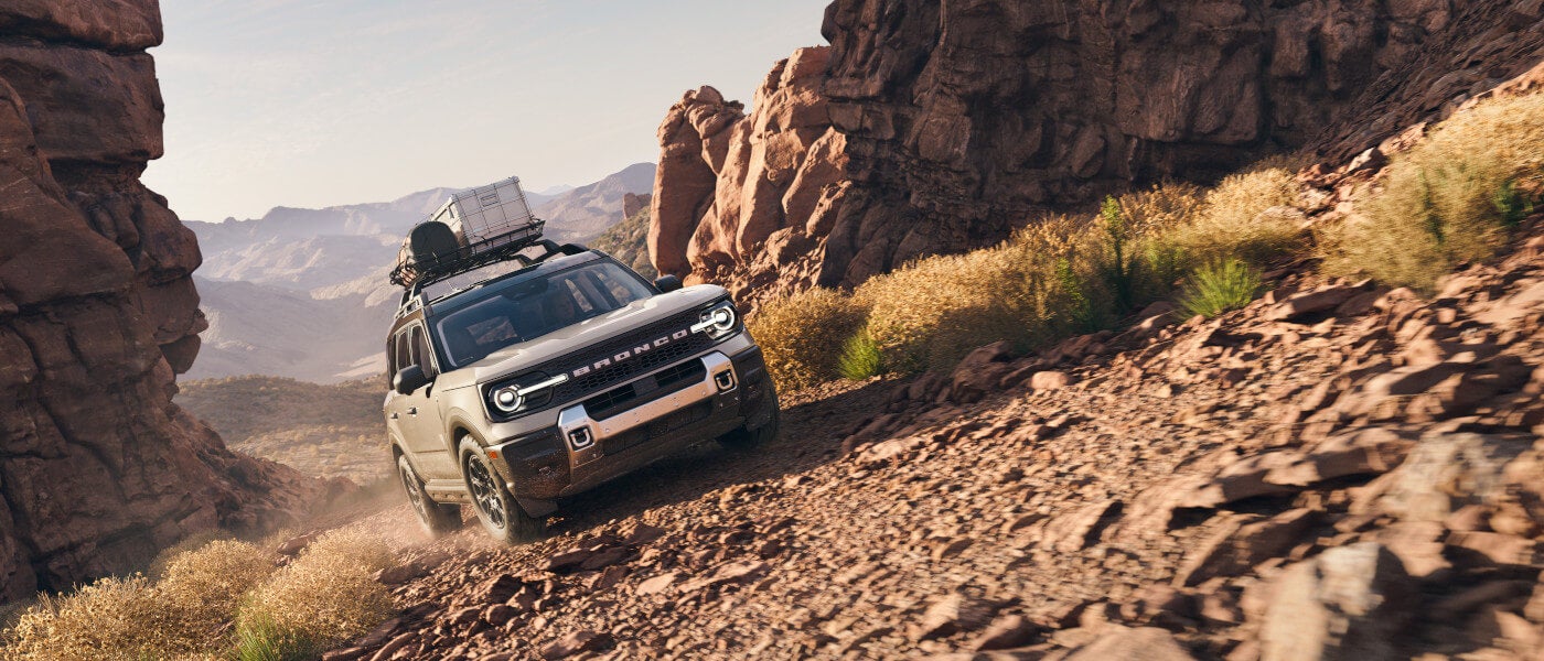 2026 Ford Bronco Sport driving up rocky incline