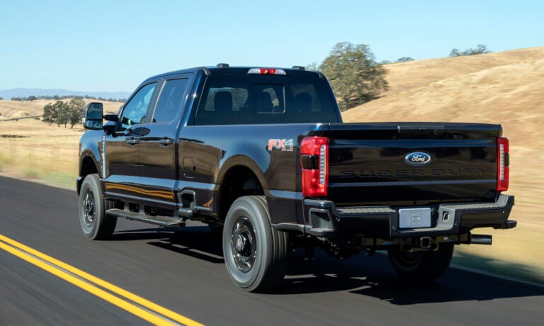 2026 Ford Super Duty driving away on highway