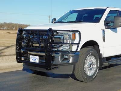 Grille guard on Front Bumper is displayed on ford vehicle parked on road from left side.